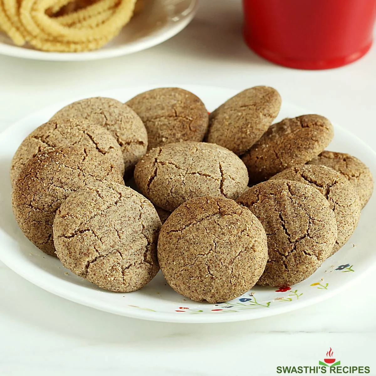 Ragi cookies also known as ragi biscuit served in a white plate