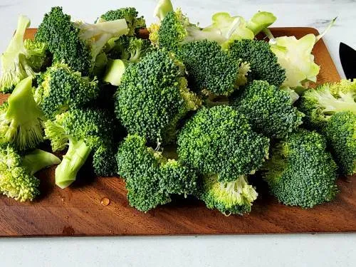 broccoli florets on a chopping board