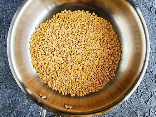 lentils in a pan to make paruppu podi