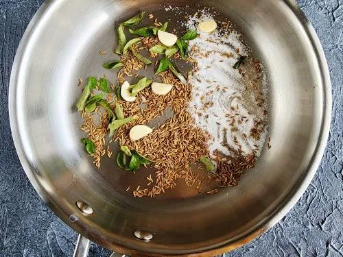 roasting spices and curry leaves