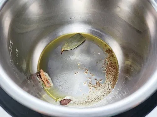 whole spices tempered in ghee