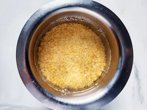 rinsed lentils in a bowl ready to pressure cook