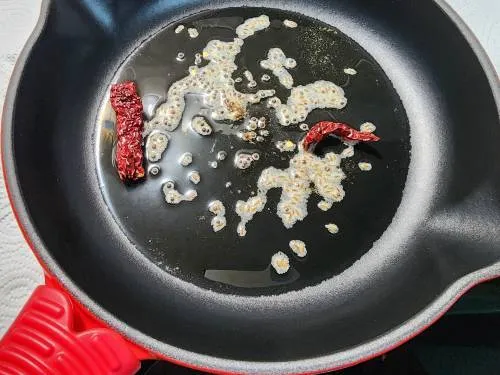 tempering spices to make keerai kootu